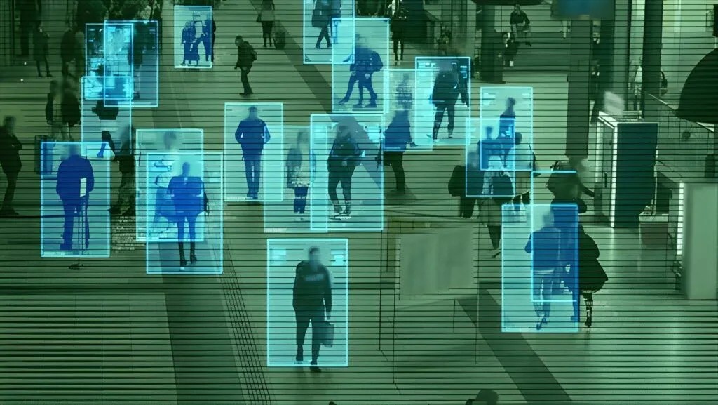 Surveillance analytics tracking individuals in a crowded public concourse during an investigation